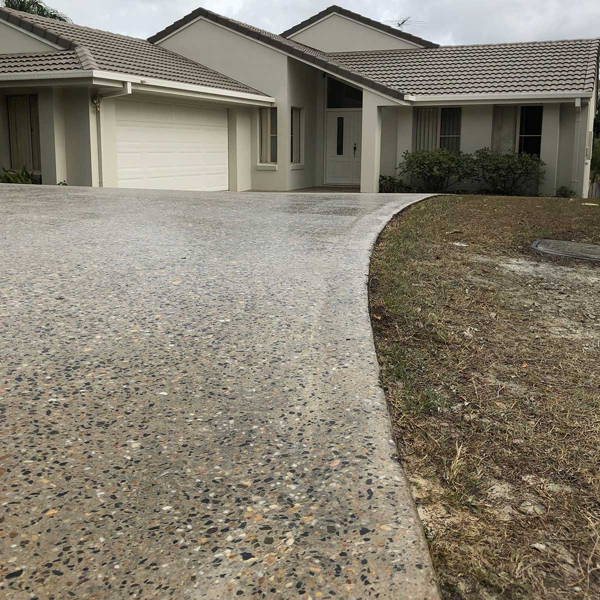 Driveway Concrete Grind and Seal in Upper Kedron by Glory Concrete Polishing