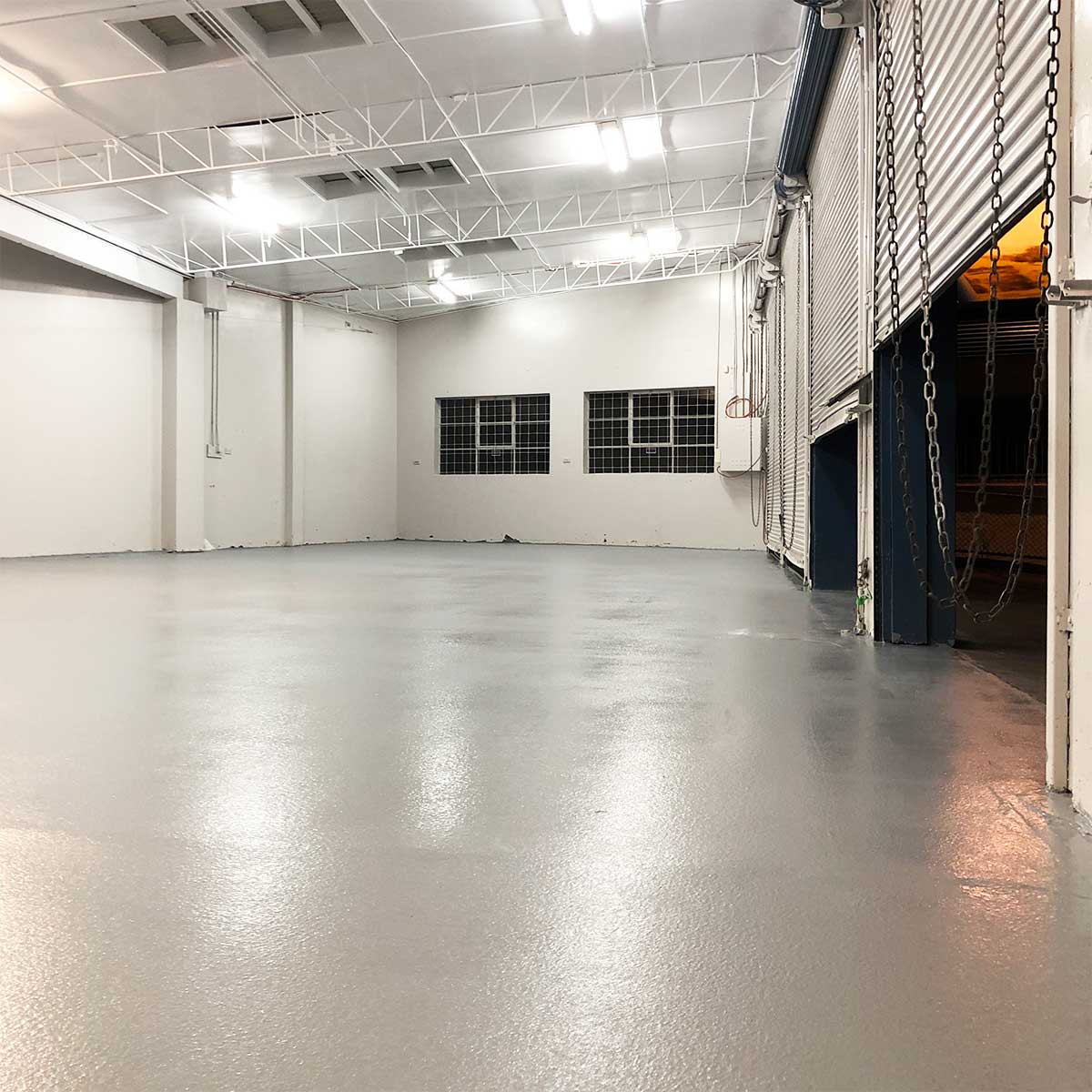 Commercial Grind and Epoxy for Jax Tyres Woolloongabba by Glory Concrete Polishing