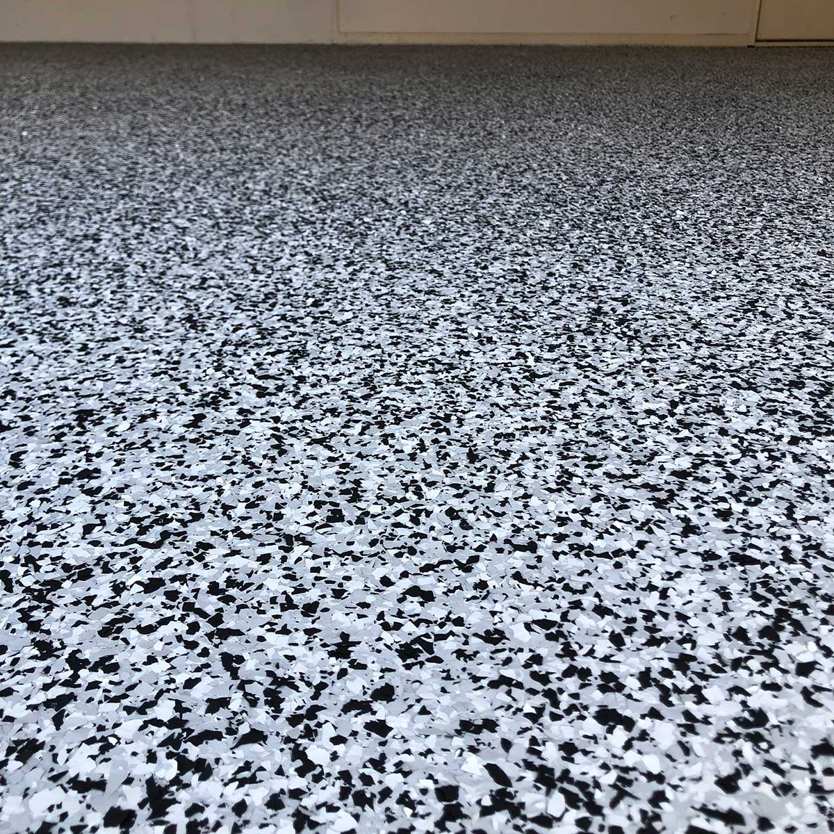 Residential Garage Grind and Epoxy Flake Flooring in Eight Mile Plains by Glory Concrete Polishing